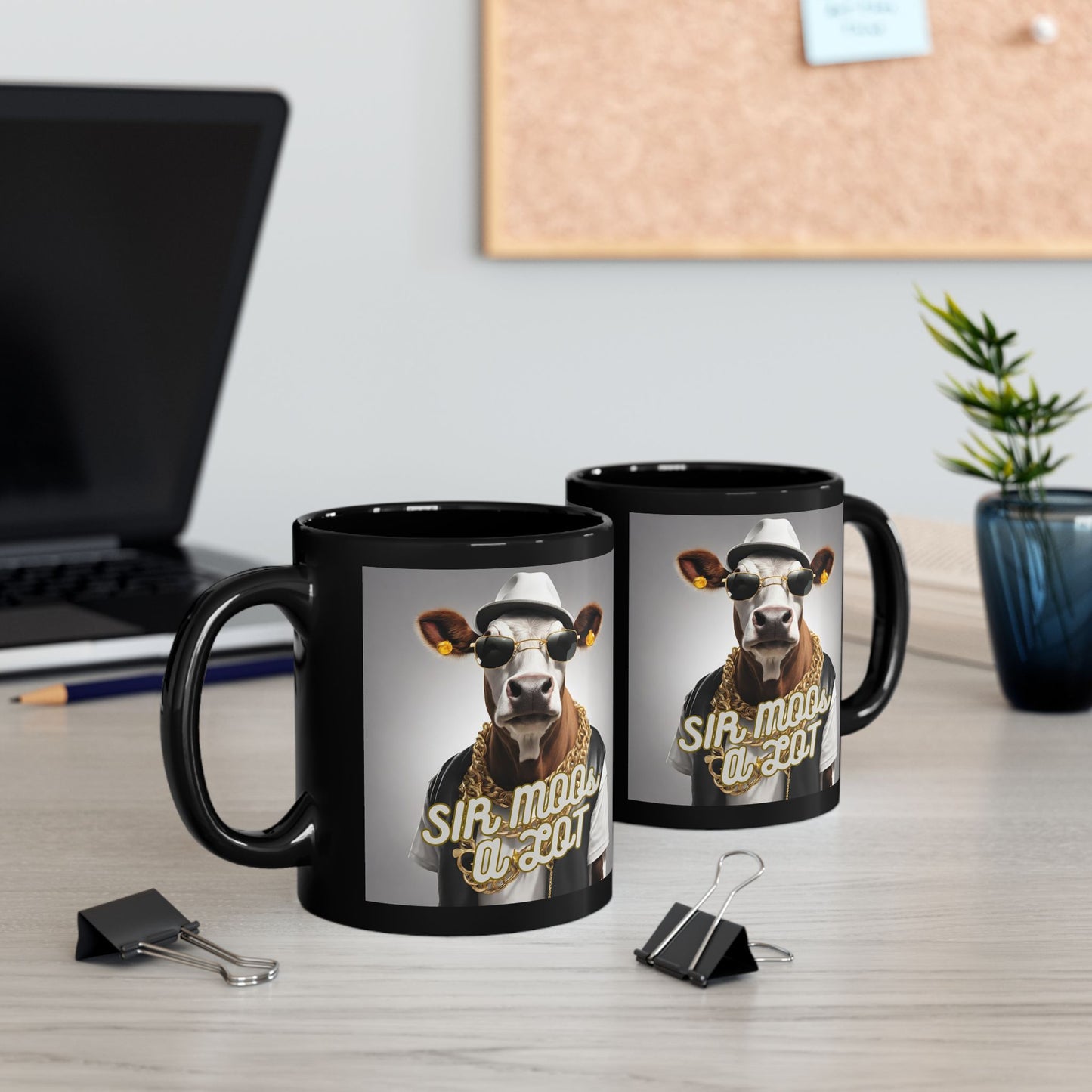 Black Coffee mug with cow dressed as hip hop artist sitting on desk